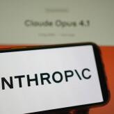 Roosendaal, The Netherlands - August 05, 2025: A mobile phone displaying the logo of Anthropic, with the company website, displaying the new Claude Opus 4.1 model in the background.