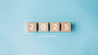 2025 New Year Loading. Loading bar with wooden blocks 2025 on blue background. Start new year 2025 with goal plan, goal concept, action plan, strategy, new year business vision.