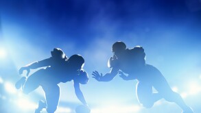 American football players in game, touchdown. Stadium lights
