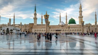 Muslims gathered for worship Nabawi Mosque, Medina, Saudi Arabia