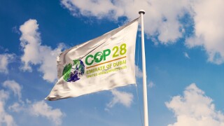 November 10, 2022, Brazil. The 2023 United Nations Climate Change Conference COP28 soon appears on a flag. Event will be on 6-17 November 2023, in Emirate of Dubai, United Arab Emirates.