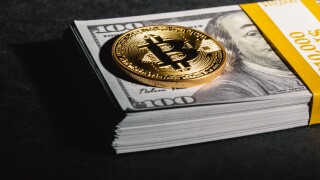 Bitcoin cryptocurrency coin with cash