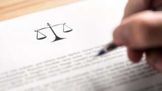 Attorney, lawyer, solicitor or jurist working on a business brie