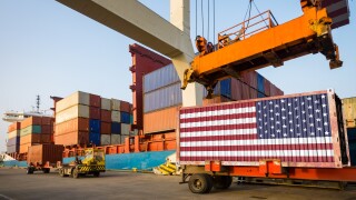 american container with usa flag in port. concept of american im