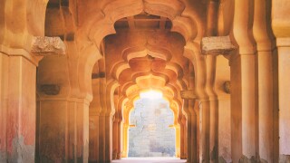 Old ruined arch of Lotus Mahal in Hampi, India
