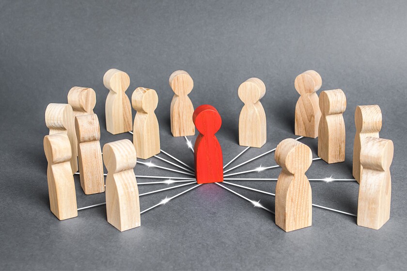 The red person is connected with employees by wide network of lines. At the center of a complex large system. Communication social. Cooperation, collaboration. Project leadership personnel management