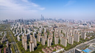 The drone aerial view of residential district in Pudong with sky