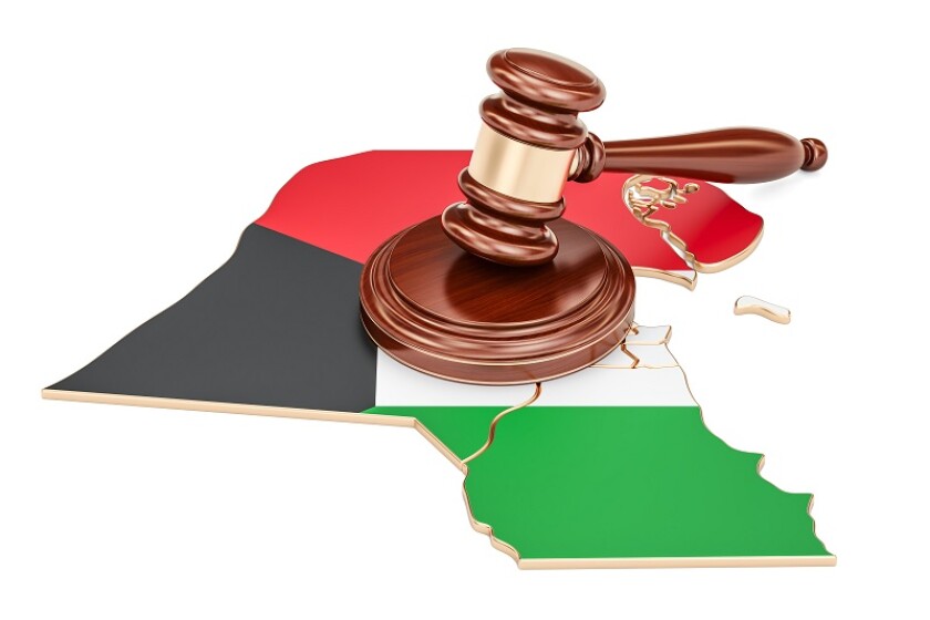 Wooden Gavel on map of Kuwait, 3D rendering