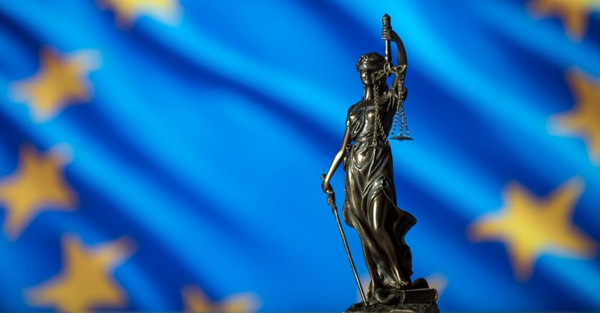 Law and Justice concept. UE flag background, place for typograph