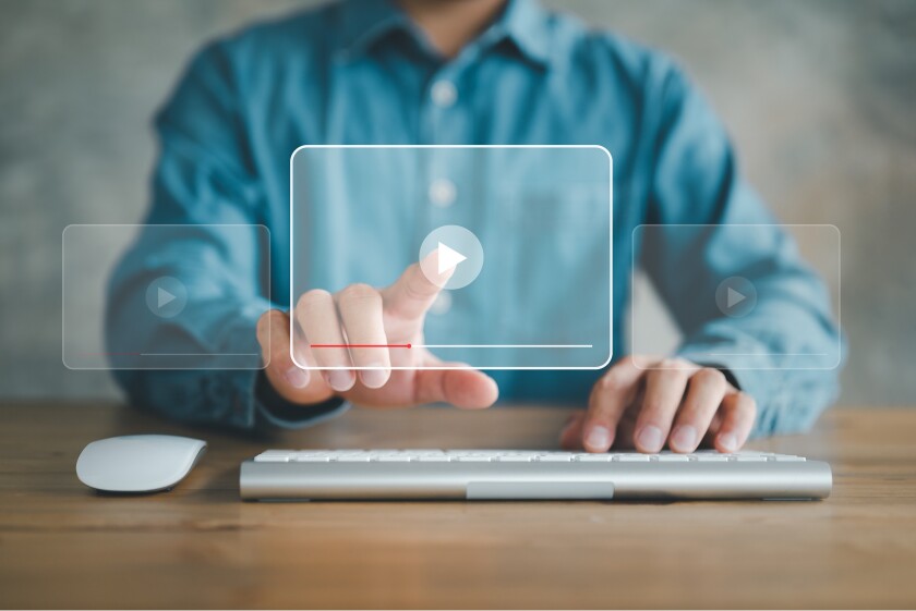 man using mouse and keyboard for streaming online, watching video on internet, live concert, show or tutorial