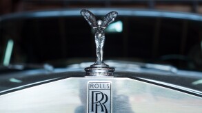 closeup of Rolls Royce logo on car