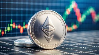 Ethereum cryptocurrency, silver coin on chart, crypto trading, blockchain, digital money