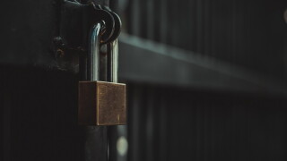 Closeup steel door with lock , padlock , key lock , dark background
