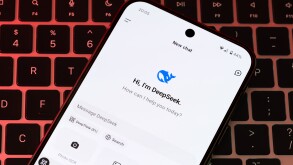 DeepSeek AI interface is seen on the smartphone placed on laptop keyboard. Concept for a new chat bot, competitor to Chat GPT. Stafford, United Kingdom, January 26, 2025