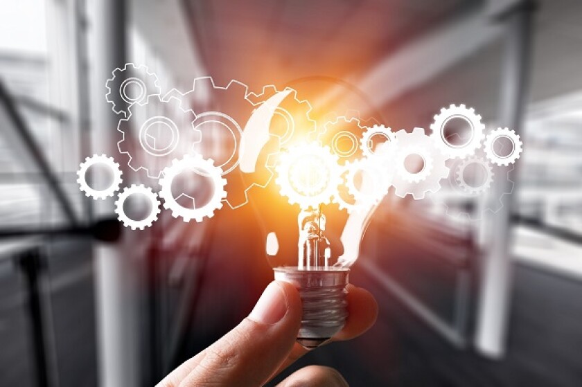 Hand holding light bulb and cog inside. Idea and imagination. Creative and inspiration. Innovation gears icon with network connection on metal texture background. Innovative technology industrial.