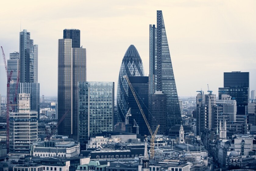 City of London business aria view at sunset. View includes Gherkin and modern skyscrapers of leading financial companies