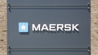 Tilst, Denmark - April 18, 2021: Maersk logo on a building. Maersk company based in Copenhagen, Denmark, is the largest container ship operator in the world