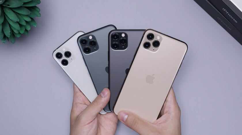 Four iPhones being held in a 'fan'