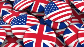 US and UK Badges Background - Pile of American and British Flag 
