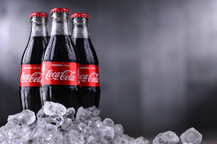 Three bottles of Coca-Cola