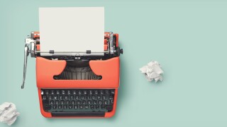 retro banner with red vintage typewriter with a blank sheet of p