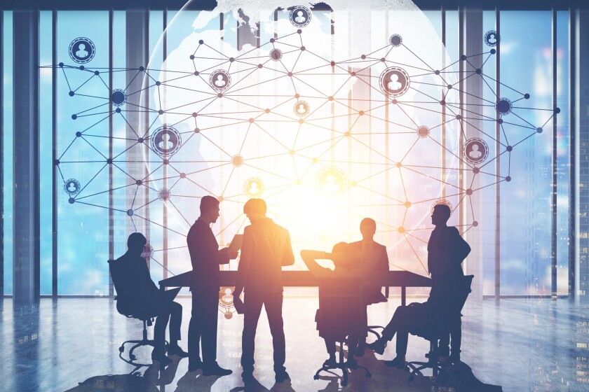 People in conference room and network