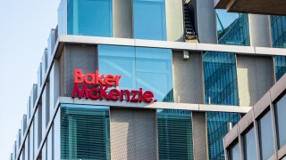 The building with a logo of Baker McKenzie international law firm in Stockholm.