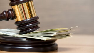 gavel on a money