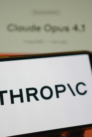 Roosendaal, The Netherlands - August 05, 2025: A mobile phone displaying the logo of Anthropic, with the company website, displaying the new Claude Opus 4.1 model in the background.