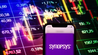 KONSKIE, POLAND - August 10, 2022: Smartphone displaying logo of Synopsys company on stock exchange chart background