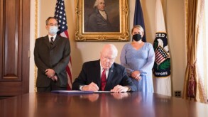 Senator Patrick Leahy signing the Bipartisan Emergency Capitol Security Appropriations Act, dated July 30