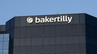 Irvine, CA, USA - May 6, 2022: Exterior view of Baker Tilly's office in Irvine, California. Baker Tilly US, LLP is a public accounting and consulting firm headquartered in Chicago, Illinois.