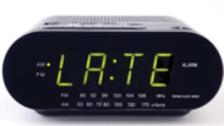 Clock Radio with the word LATE