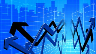 Business graph superimposed on city skyline