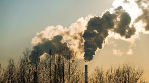 thick smoke belching from factory chimneys