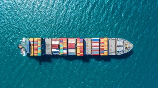 container ship in import export and business logistic.By crane ,