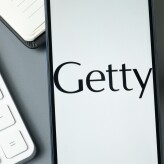 New York, USA - 30 August 2024: Getty Logo on Phone Screen, Company Icon on Display