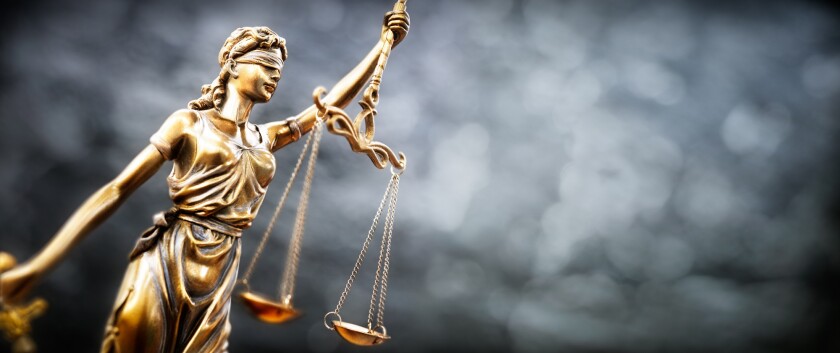 Legal and law concept statue of Lady Justice with scales of just