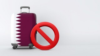Qatar flag suitcase with no entry sign. Travel ban concept. 3D Render