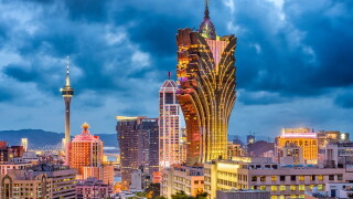 Macau, China city skyline at dusk.