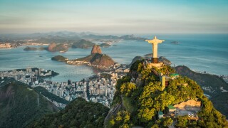 Aerial view of Christ and Botafogo Bay from high angle.