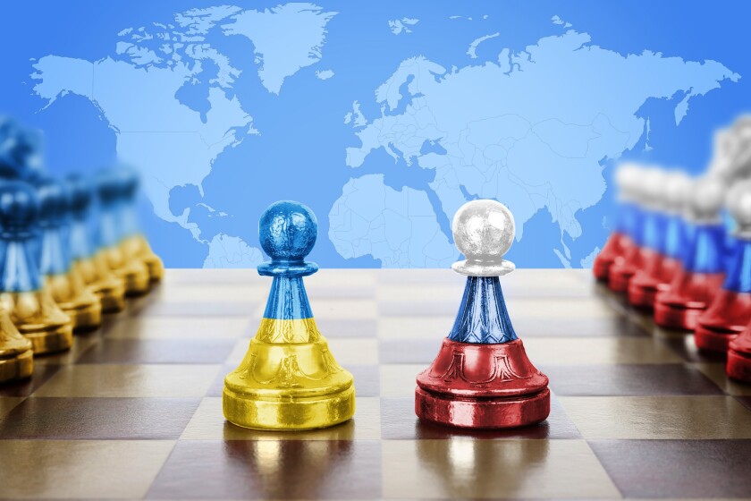 Concept of war between Ukraine and Russia. Chess pieces in color