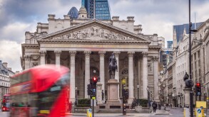 London, England - Iconic red double decker busses on the move an