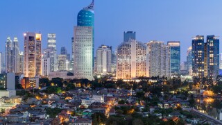 Jakarta downtown skyline with high-rise buildings at  sunset