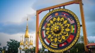 Beautiful Buddhist giant gong with southeast asian flags painted at Wat Tham Khuha Sawan temple, Khong Chiam District, Ubon Ratchathani Province,Thailand.