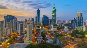 The colorful panoramic skyline of Panama City at sunset with high rise skyscrapers, Panama, Central America.