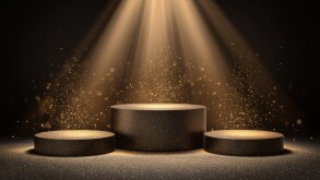 Dark, elegant podiums illuminated by golden spotlight