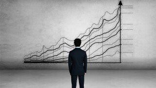 Businessman and chart of investment performance