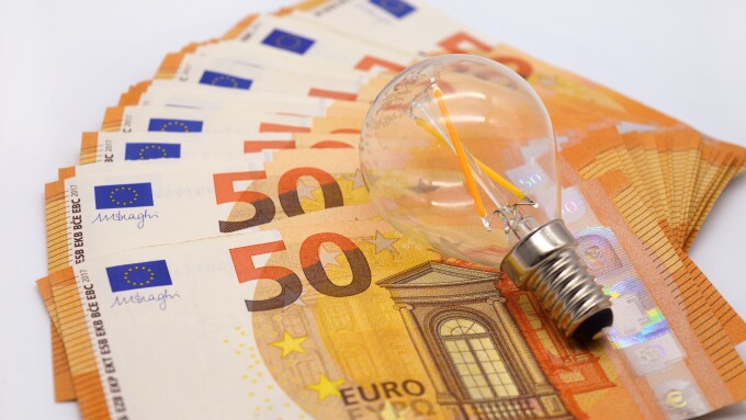 Euro notes and a lightbulb