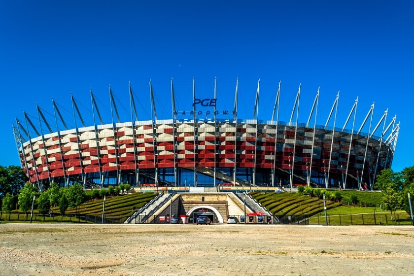 Warsaw, Poland – July 16, 2017: National football stadium of poland in Warsaw. Sunny summer day with a blue sky and green trees. Horizontal photo.